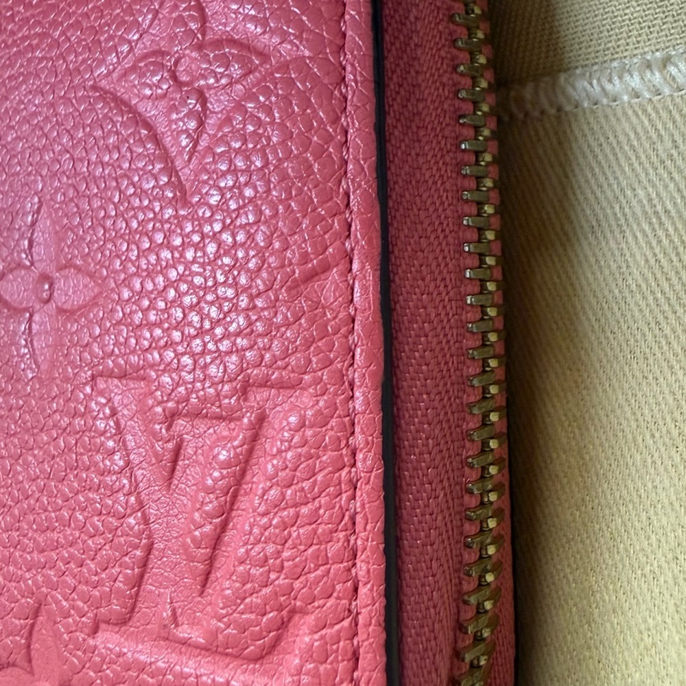 Authenticated Louis Vuitton Pink/Coral Monogram Empreinte Zippy Leather Wallet - Picture 7 of 16